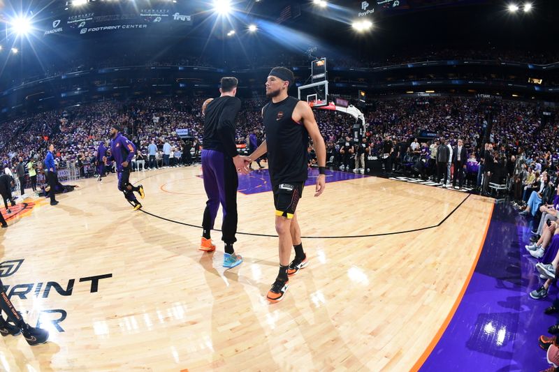 PHOENIX, AZ - APRIL  26: Devin Booker #1 of the Phoenix Suns warms up before the game against the Minnesota Timberwolves on April 26, 2024 at Footprint Center in Phoenix, Arizona. NOTE TO USER: User expressly acknowledges and agrees that, by downloading and or using this photograph, user is consenting to the terms and conditions of the Getty Images License Agreement. Mandatory Copyright Notice: Copyright 2024 NBAE (Photo by Kate Frese/NBAE via Getty Images)