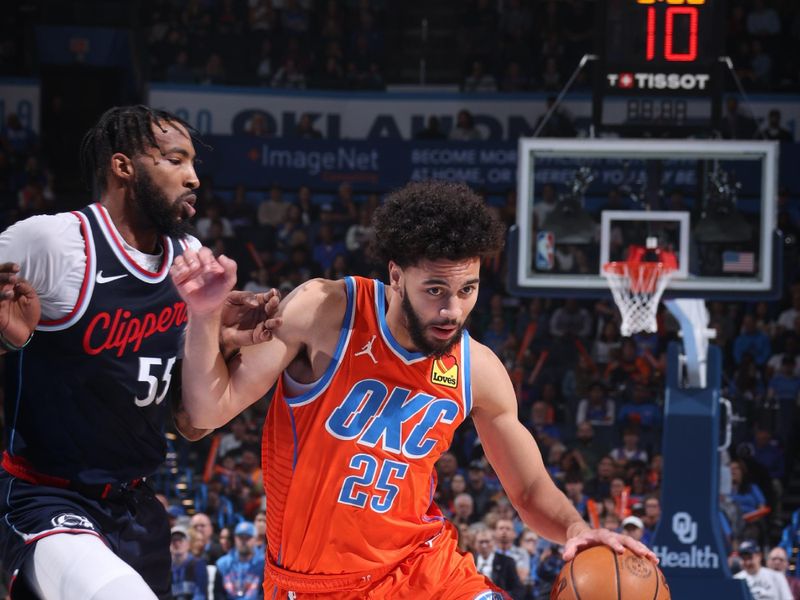 OKLAHOMA CITY, OK - NOVEMBER 11: Ajay Mitchell #25 of the Oklahoma City Thunder drives to the basket during the game against the LA Clippers on November 11, 2024 at Paycom Center in Oklahoma City, Oklahoma. NOTE TO USER: User expressly acknowledges and agrees that, by downloading and or using this photograph, User is consenting to the terms and conditions of the Getty Images License Agreement. Mandatory Copyright Notice: Copyright 2024 NBAE (Photo by Nathaniel S. Butler/NBAE via Getty Images)