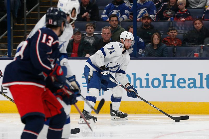 Feb 10, 2024; Columbus, Ohio, USA; Tampa Bay Lightning center Anthony Cirelli (71) shoots against the Columbus Blue Jackets during the third period at Nationwide Arena. Mandatory Credit: Russell LaBounty-USA TODAY Sports