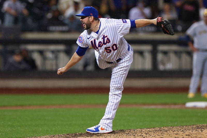 Jun 27, 2023; New York City, New York, USA;  New York Mets relief pitcher Dominic Leone (50) delivers a pitch during the ninth inning against the Milwaukee Brewers at Citi Field. Mandatory Credit: Vincent Carchietta-USA TODAY Sports