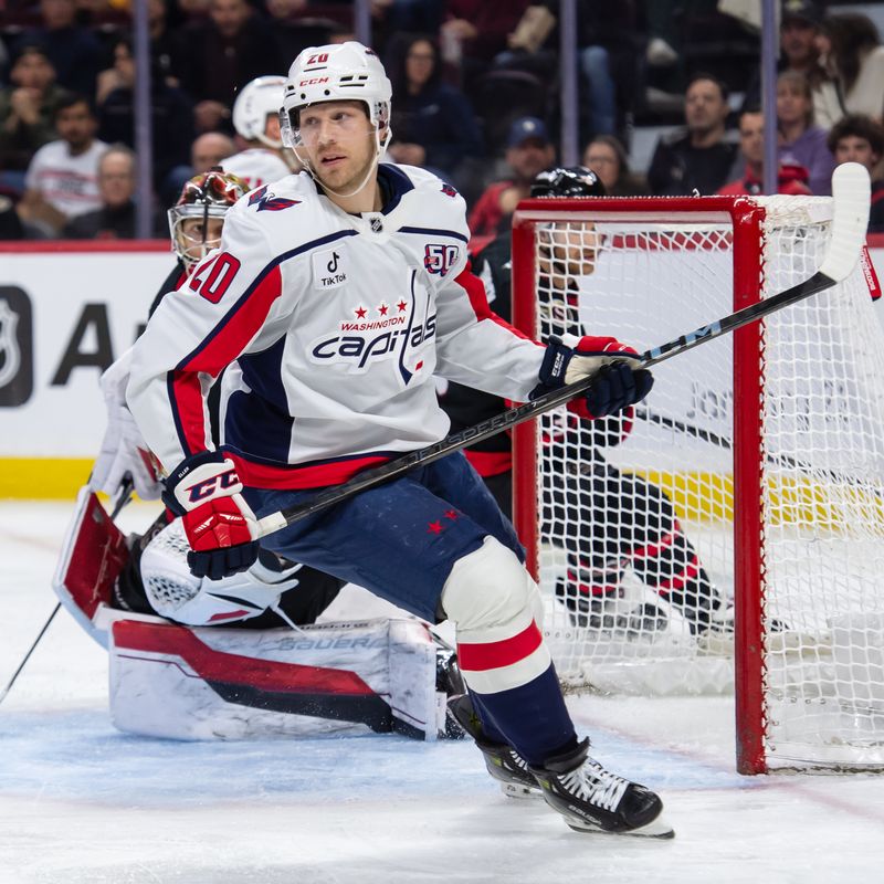 Jan 16, 2025; Ottawa, Ontario, CAN; Washington Capitals center Lars Eller (20) follows the puck in the second period against the Ottawa Senators at the Canadian Tire Centre. Mandatory Credit: Marc DesRosiers-Imagn Images