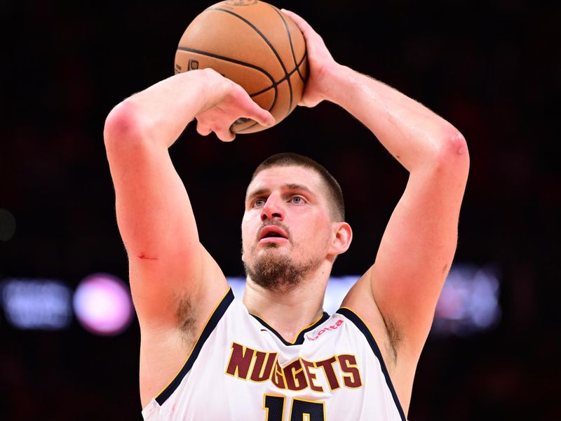 ATLANTA, GA - DECEMBER 8: Nikola Jokic #15 of the Denver Nuggets shoots the ball during the game against the Atlanta Hawks on December 8, 2024 at State Farm Arena in Atlanta, Georgia.  NOTE TO USER: User expressly acknowledges and agrees that, by downloading and/or using this Photograph, user is consenting to the terms and conditions of the Getty Images License Agreement. Mandatory Copyright Notice: Copyright 2024 NBAE (Photo by Adam Hagy/NBAE via Getty Images)