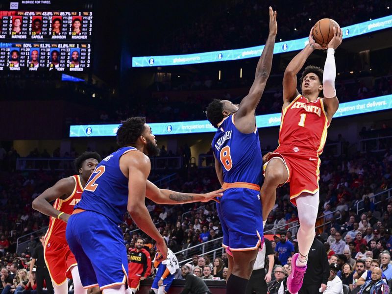 ATLANTA, GA - November 6:  Jalen Johnson #1 of the Atlanta Hawks shoots the ball during the game against the New York Knicks on November 6, 2024 at State Farm Arena in Atlanta, Georgia.  NOTE TO USER: User expressly acknowledges and agrees that, by downloading and/or using this Photograph, user is consenting to the terms and conditions of the Getty Images License Agreement. Mandatory Copyright Notice: Copyright 2024 NBAE (Photo by Adam Hagy/NBAE via Getty Images)