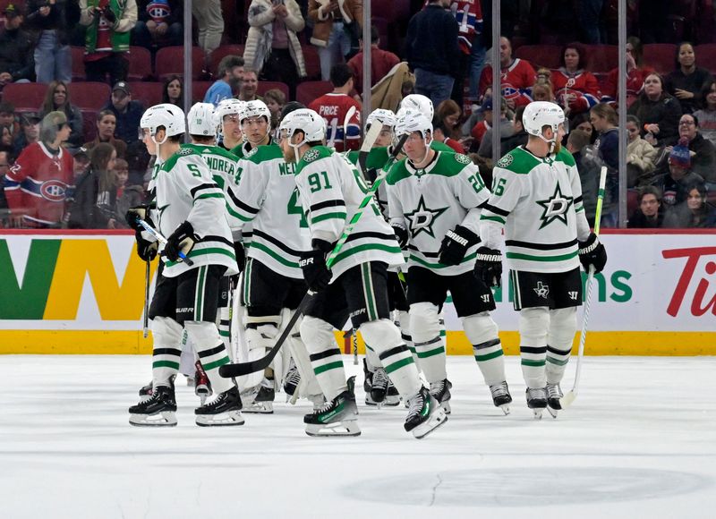 Feb 10, 2024; Montreal, Quebec, CAN; Dallas Stars forward Tyler Seguin (91) and teammates celebrate after defeating the Montreal Canadiens at the Bell Centre. Mandatory Credit: Eric Bolte-USA TODAY Sports