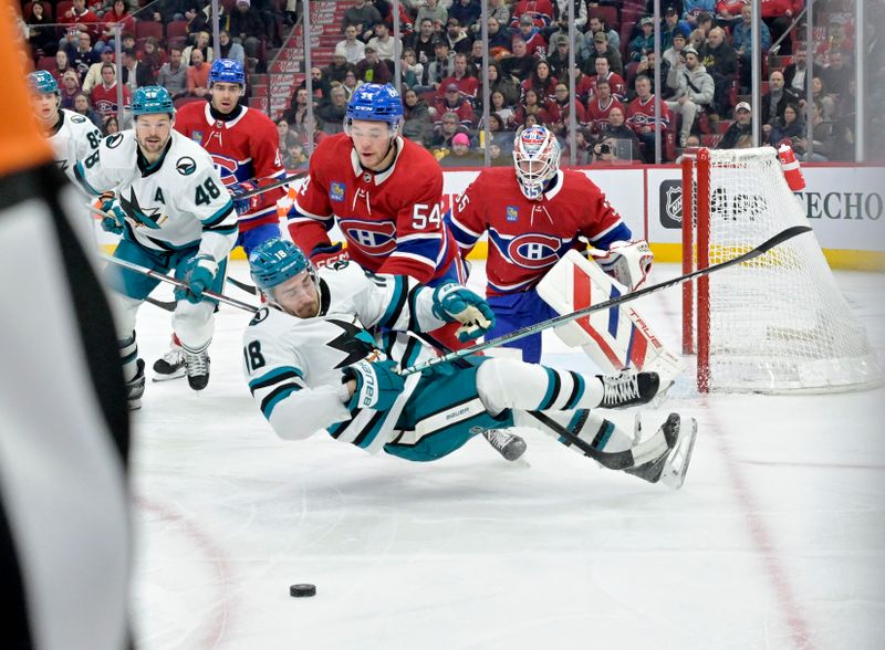 Jan 11, 2024; Montreal, Quebec, CAN; Montreal Canadiens defenseman Jordan Harris (54) trips San Jose Sharks forward Filip Zadina (18) during the second period at the Bell Centre. Mandatory Credit: Eric Bolte-USA TODAY Sports