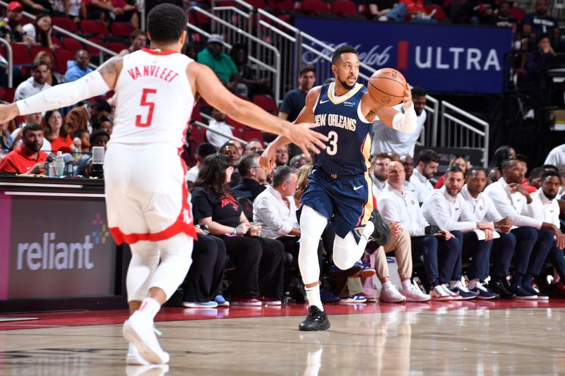 HOUSTON, TX - OCTOBER 15: CJ McCollum #3 of the New Orleans Pelicans dribbles the ball during the game against the Houston Rockets during a NBA preseason game on October 15, 2024 at the Toyota Center in Houston, Texas. NOTE TO USER: User expressly acknowledges and agrees that, by downloading and or using this photograph, User is consenting to the terms and conditions of the Getty Images License Agreement. Mandatory Copyright Notice: Copyright 2024 NBAE (Photo by Logan Riely/NBAE via Getty Images)