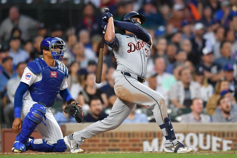 Aug 21, 2024; Chicago, Illinois, USA; Detroit Tigers designated hitter Riley Greene (31) hits a two-run home run during the second inning against the Chicago Cubs at Wrigley Field. Mandatory Credit: Patrick Gorski-USA TODAY Sports