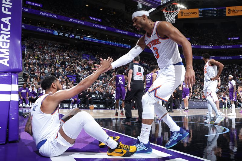 SALT LAKE CITY, UT - NOVEMBER 23: Josh Hart #3 of the New York Knicks helps up Cameron Payne #1 during the game against the Utah Jazz on November 23, 2024 at Delta Center in Salt Lake City, Utah. NOTE TO USER: User expressly acknowledges and agrees that, by downloading and or using this Photograph, User is consenting to the terms and conditions of the Getty Images License Agreement. Mandatory Copyright Notice: Copyright 2024 NBAE (Photo by Melissa Majchrzak/NBAE via Getty Images)