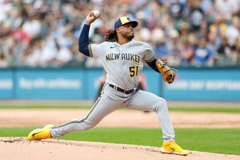 Aug 13, 2023; Chicago, Illinois, USA; Milwaukee Brewers starting pitcher Freddy Peralta (51) delivers a pitch against the Chicago White Sox during the first inning at Guaranteed Rate Field. Mandatory Credit: Kamil Krzaczynski-USA TODAY Sports