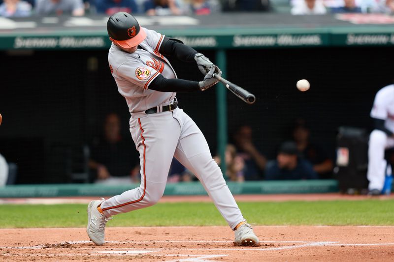 Sep 24, 2023; Cleveland, Ohio, USA; Baltimore Orioles second baseman Jordan Westburg (11) hits an RBI single against the Cleveland Guardians during the second inning at Progressive Field. Mandatory Credit: Aaron Josefczyk-USA TODAY Sports