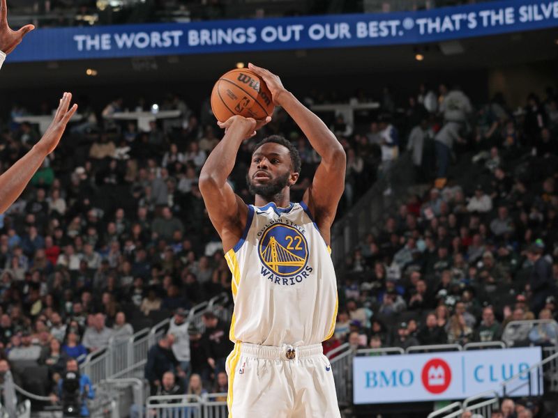 MILWAUKEE, WI - JANUARY 13: Andrew Wiggins #22 of the Golden State Warriors shoots the ball during the game against the Milwaukee Bucks on January 13, 2024 at the Fiserv Forum Center in Milwaukee, Wisconsin. NOTE TO USER: User expressly acknowledges and agrees that, by downloading and or using this Photograph, user is consenting to the terms and conditions of the Getty Images License Agreement. Mandatory Copyright Notice: Copyright 2024 NBAE (Photo by Gary Dineen/NBAE via Getty Images).