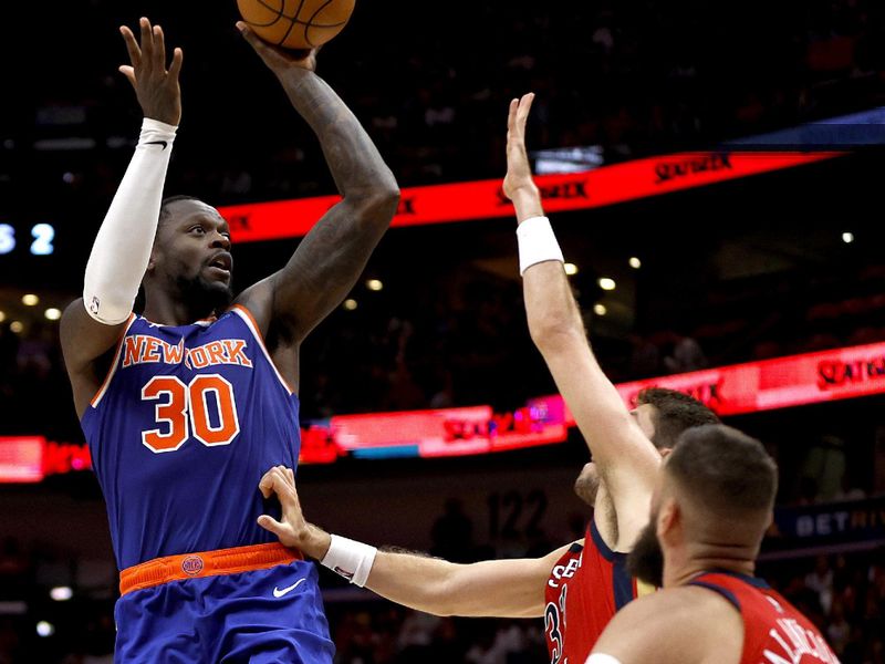 NEW ORLEANS, LOUISIANA - OCTOBER 28: Julius Randle #30 of the New York Knicks shoots over Matt Ryan #37 of the New Orleans Pelicans during the third quarter of an NBA game at Smoothie King Center on October 28, 2023 in New Orleans, Louisiana. NOTE TO USER: User expressly acknowledges and agrees that, by downloading and or using this photograph, User is consenting to the terms and conditions of the Getty Images License Agreement. (Photo by Sean Gardner/Getty Images)