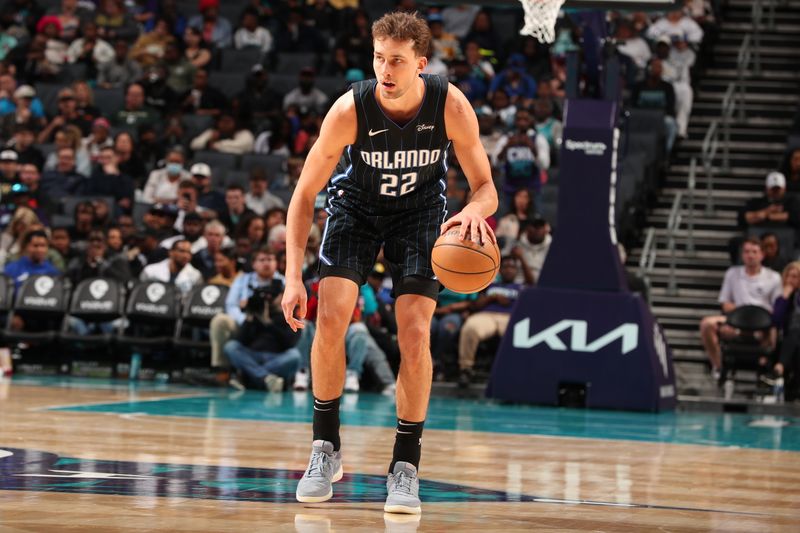 CHARLOTTE, NC - APRIL 5: Franz Wagner #22 of the Orlando Magic handles the ball during the game against the Charlotte Hornets on April 5, 2024 at Spectrum Center in Charlotte, North Carolina. NOTE TO USER: User expressly acknowledges and agrees that, by downloading and or using this photograph, User is consenting to the terms and conditions of the Getty Images License Agreement. Mandatory Copyright Notice: Copyright 2024 NBAE (Photo by Kent Smith/NBAE via Getty Images)