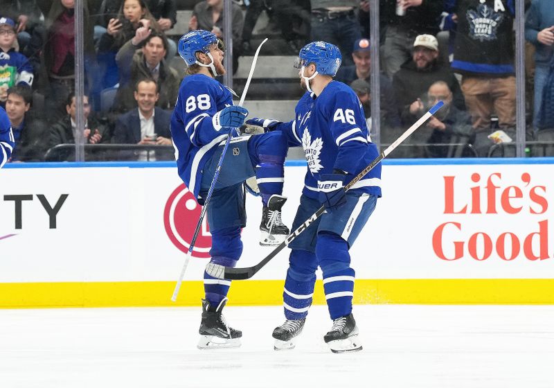 Mar 6, 2024; Toronto, Ontario, CAN; Toronto Maple Leafs right wing William Nylander (88) scores a goal and celebrates with Toronto Maple Leafs defenseman Ilya Lyubushkin (46) against the Buffalo Sabres during the second period at Scotiabank Arena. Mandatory Credit: Nick Turchiaro-USA TODAY Sports