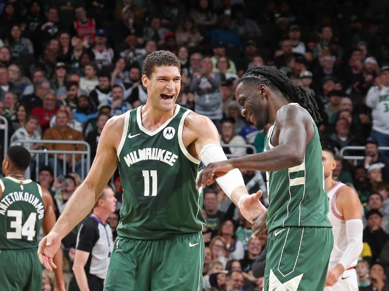 MILWAUKEE, WI - NOVEMBER 20: Brook Lopez #11 of the Milwaukee Bucks celebrates with Taurean Prince #12 during the game against the Chicago Bulls on November 20, 2024 at the Fiserv Forum Center in Milwaukee, Wisconsin. NOTE TO USER: User expressly acknowledges and agrees that, by downloading and or using this Photograph, user is consenting to the terms and conditions of the Getty Images License Agreement. Mandatory Copyright Notice: Copyright 2024 NBAE (Photo by Gary Dineen/NBAE via Getty Images).