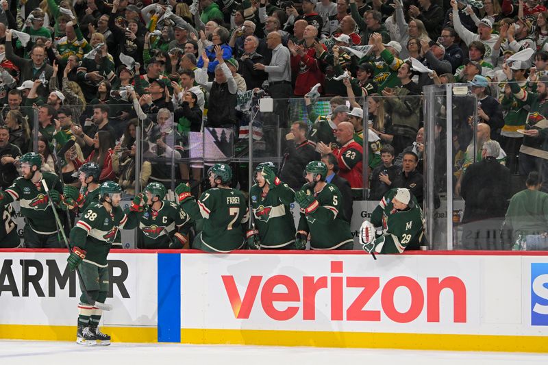 May 1, 2025; Saint Paul, Minnesota, USA;  Minnesota Wild forward Ryan Hartman (38) celebrates his goal against the Vegas Golden Knights during the first  period in game six of the first round of the 2025 Stanley Cup Playoffs at Xcel Energy Center. Mandatory Credit: Nick Wosika-Imagn Images