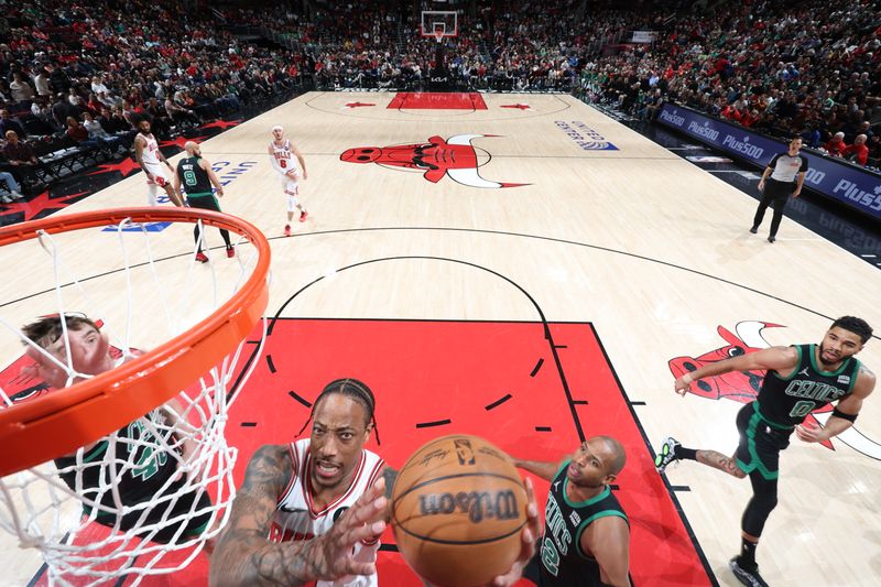 CHICAGO, IL - MARCH 23: DeMar DeRozan #11 of the Chicago Bulls drives to the basket during the game against the Boston Celtics on March 23, 2024 at United Center in Chicago, Illinois. NOTE TO USER: User expressly acknowledges and agrees that, by downloading and or using this photograph, User is consenting to the terms and conditions of the Getty Images License Agreement. Mandatory Copyright Notice: Copyright 2024 NBAE (Photo by Jeff Haynes/NBAE via Getty Images)