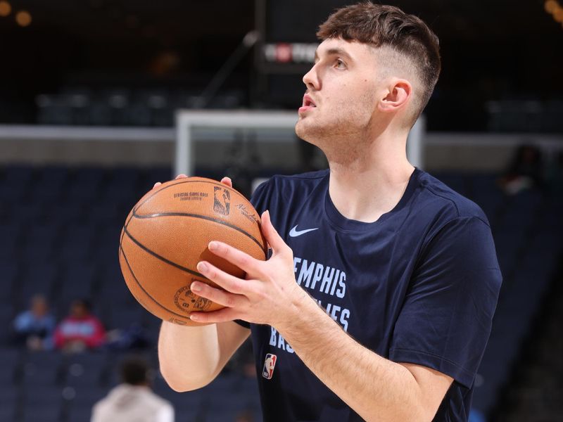 MEMPHIS, TN - JANUARY 29:  Matthew Hurt #20 of the Memphis Grizzles warms up before the game against the Sacramento Kings on January 29, 2024 at FedExForum in Memphis, Tennessee. NOTE TO USER: User expressly acknowledges and agrees that, by downloading and or using this photograph, User is consenting to the terms and conditions of the Getty Images License Agreement. Mandatory Copyright Notice: Copyright 2024 NBAE (Photo by Joe Murphy/NBAE via Getty Images)