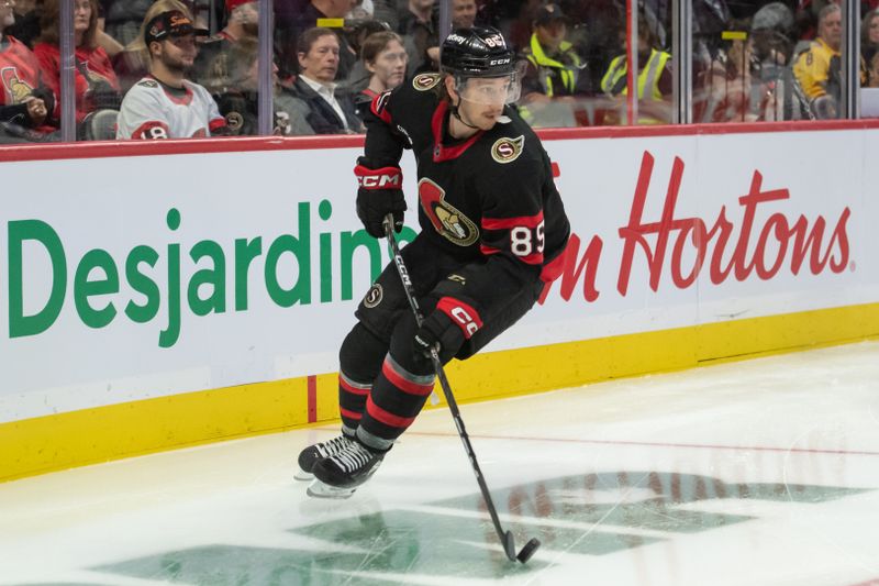 Oct 18, 2023; Ottawa, Ontario, CAN; Ottawa Senators defenseman Jake Sanderson (85) skates with the puck in the second period against the Washington Capitals at the Canadian Tire Centre. Mandatory Credit: Marc DesRosiers-USA TODAY Sports