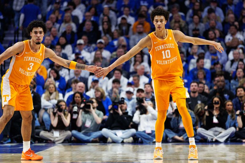 Feb 7, 2026; Lexington, Kentucky, USA; Tennessee Volunteers forward Nate Ament (10) celebrates with guard Bishop Boswell (3) during the first half against the Kentucky Wildcats at Rupp Arena at Central Bank Center. Mandatory Credit: Jordan Prather-Imagn Images