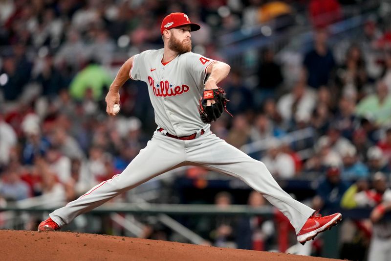 Oct 12, 2022; Atlanta, Georgia, USA; Philadelphia Phillies starting pitcher Zack Wheeler (45) throws against the Atlanta Braves in the first inning during game two of the NLDS for the 2022 MLB Playoffs at Truist Park. Mandatory Credit: Dale Zanine-USA TODAY Sports