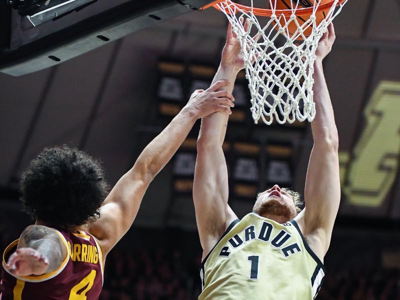 Feb 15, 2024; West Lafayette, Indiana, USA; Minnesota Golden Gophers guard Braeden Carrington (4) fouls Purdue Boilermakers forward Caleb Furst (1) during the second half at Mackey Arena. Mandatory Credit: Robert Goddin-USA TODAY Sports