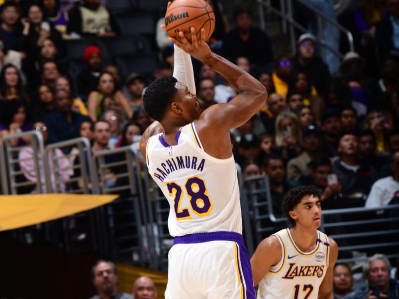 LOS ANGELES, CA - DECEMBER 8: Rui Hachimura #28 of the Los Angeles Lakers shoots a three point basket during the game  against the Portland Trail Blazers on December 8, 2024 at Crypto.Com Arena in Los Angeles, California. NOTE TO USER: User expressly acknowledges and agrees that, by downloading and/or using this Photograph, user is consenting to the terms and conditions of the Getty Images License Agreement. Mandatory Copyright Notice: Copyright 2024 NBAE (Photo by Adam Pantozzi/NBAE via Getty Images)