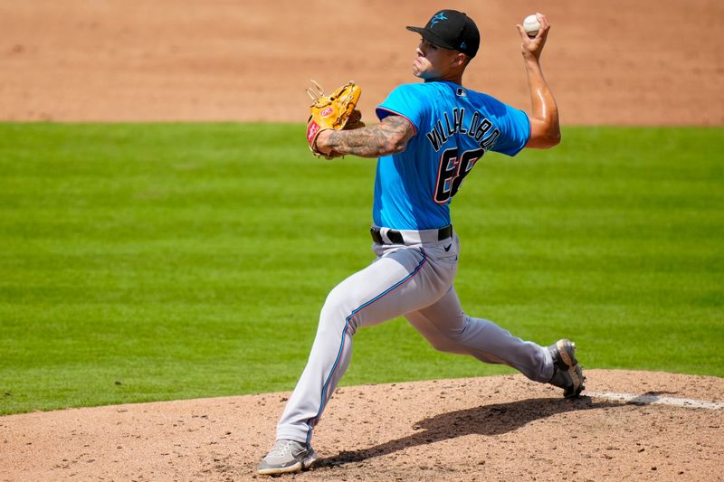 Mar 12, 2023; West Palm Beach, Florida, USA; Miami Marlins pitcher Eli Villalobos (68) throws a pitch against the Houston Astros during the sixth inning at The Ballpark of the Palm Beaches. Mandatory Credit: Rich Storry-USA TODAY Sports