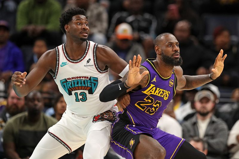 MEMPHIS, TENNESSEE - NOVEMBER 06: LeBron James #23 of the Los Angeles Lakers guards Jaren Jackson Jr. #13 of the Memphis Grizzlies in the first half at FedExForum on November 06, 2024 in Memphis, Tennessee. NOTE TO USER: User expressly acknowledges and agrees that, by downloading and or using this photograph, User is consenting to the terms and conditions of the Getty Images License Agreement. (Photo by Justin Ford/Getty Images)