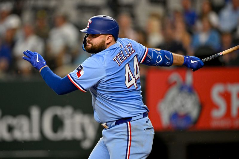 Aug 24, 2025; Arlington, Texas, USA; Texas Rangers first baseman Rowdy Tellez (44) bats against the Cleveland Guardians during the sixth inning at Globe Life Field. Mandatory Credit: Jerome Miron-Imagn Images