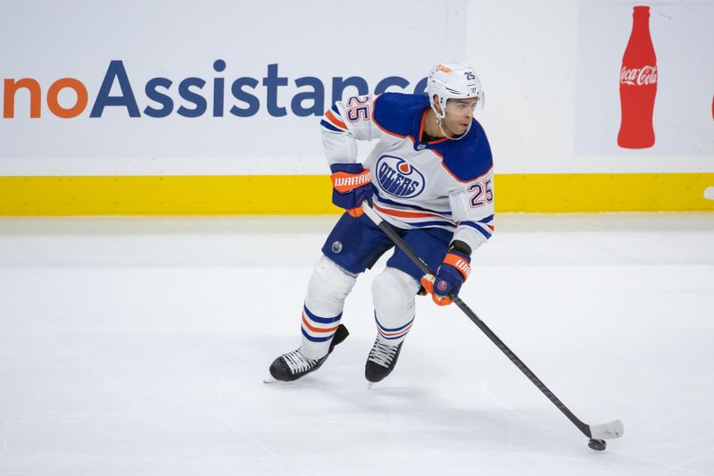 Mar 24, 2024; Ottawa, Ontario, CAN; Edmonton Oilers defenseman Darnell Nurse (25) skates with the puck in the third period against the Ottawa Senators at the Canadian Tire Centre. Mandatory Credit: Marc DesRosiers-USA TODAY Sports