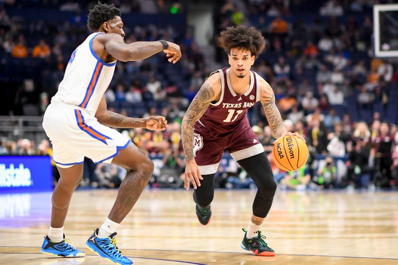 Mar 16, 2024; Nashville, TN, USA;  Texas A&M Aggies forward Andersson Garcia (11) dribbles against the Florida Gators during the first half at Bridgestone Arena. Mandatory Credit: Steve Roberts-USA TODAY Sports