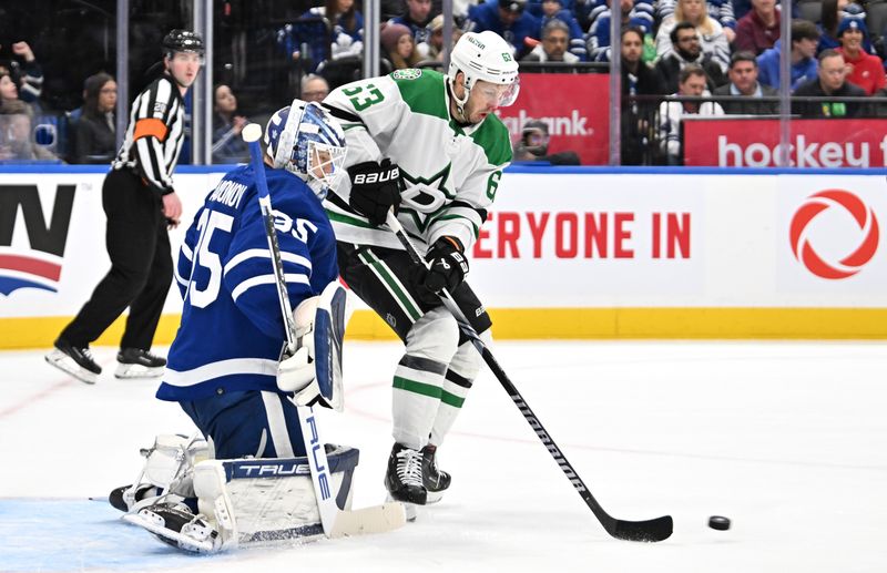 Feb 7, 2024; Toronto, Ontario, CAN; Dallas Stars forward Evgenii Dadonov (63) tries to deflect a shot past Toronto Maple Leafs goalie Ilya Samsonov (35) in the second period at Scotiabank Arena. Mandatory Credit: Dan Hamilton-USA TODAY Sports