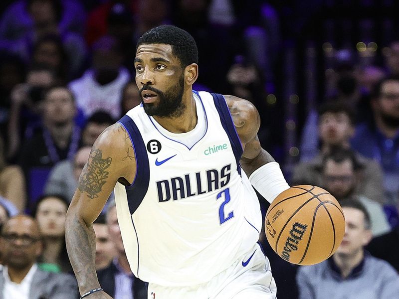 PHILADELPHIA, PENNSYLVANIA - MARCH 29: Kyrie Irving #2 of the Dallas Mavericks dribbles during the fourth quarter against the Philadelphia 76ers at Wells Fargo Center on March 29, 2023 in Philadelphia, Pennsylvania. NOTE TO USER: User expressly acknowledges and agrees that, by downloading and or using this photograph, User is consenting to the terms and conditions of the Getty Images License Agreement. (Photo by Tim Nwachukwu/Getty Images)