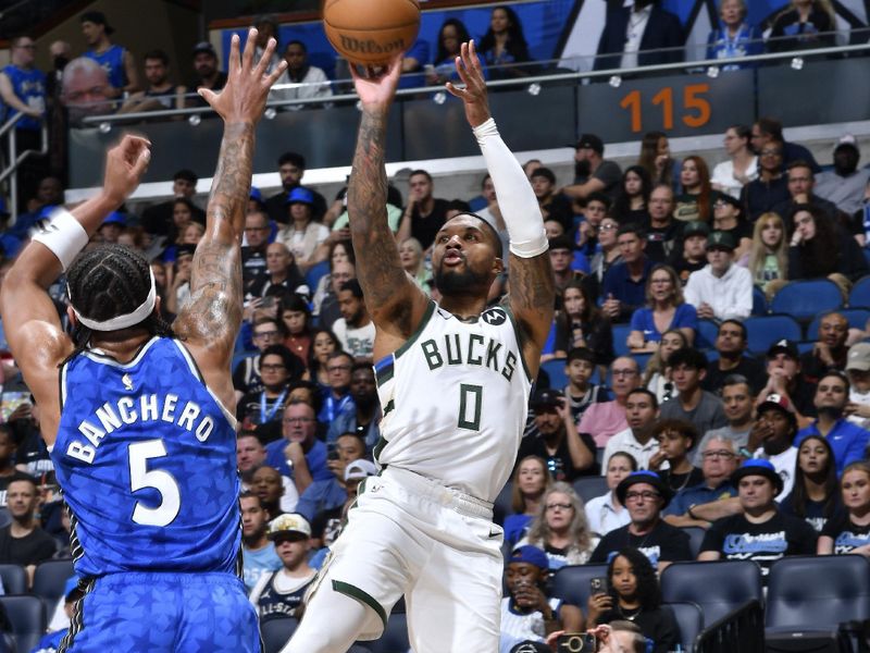 ORLANDO, FL - APRIL 14: Damian Lillard #0 of the Milwaukee Bucks shoots the ball during the game against the Orlando Magic on April 14, 2024 at Kia Center in Orlando, Florida. NOTE TO USER: User expressly acknowledges and agrees that, by downloading and or using this photograph, User is consenting to the terms and conditions of the Getty Images License Agreement. Mandatory Copyright Notice: Copyright 2024 NBAE (Photo by Gary Bassing/NBAE via Getty Images)