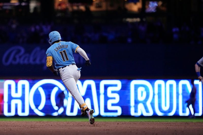 Jun 28, 2024; Milwaukee, Wisconsin, USA;  Milwaukee Brewers right fielder Jackson Chourio (11) rounds the bases after hitting a grand slam home run during the fourth inning against the Chicago Cubs at American Family Field. Mandatory Credit: Jeff Hanisch-USA TODAY Sports