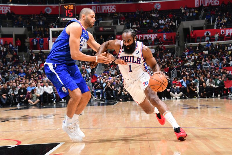 LOS ANGELES, CA - JANUARY 17: James Harden #1 of the Philadelphia 76ers dribbles the ball during the game against the LA Clippers on January 17, 2023 at Crypto.Com Arena in Los Angeles, California. NOTE TO USER: User expressly acknowledges and agrees that, by downloading and/or using this Photograph, user is consenting to the terms and conditions of the Getty Images License Agreement. Mandatory Copyright Notice: Copyright 2023 NBAE (Photo by Adam Pantozzi/NBAE via Getty Images)