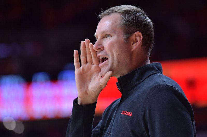 Feb 4, 2024; Champaign, Illinois, USA;  Nebraska Cornhuskers Head Coach Fred Hoiberg talks with players during the first half against the Illinois Fighting Illini at State Farm Center. Mandatory Credit: Ron Johnson-USA TODAY Sports