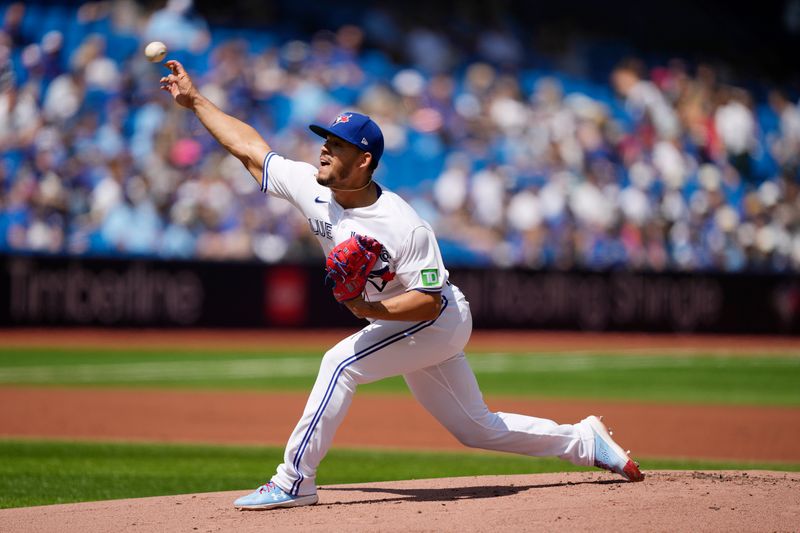 Jul 30, 2023; Toronto, Ontario, CAN; Toronto Blue Jays starting pitcher Jose Berrios (17) pitches to the Los Angeles Angels during the first inning at Rogers Centre. Mandatory Credit: John E. Sokolowski-USA TODAY Sports