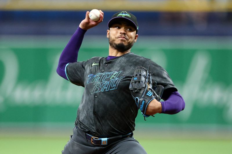 Sep 21, 2024; St. Petersburg, Florida, USA; Tampa Bay Rays pitcher Taj Bradley (45) throws a pitch against the Toronto Blue Jays in the first inning at Tropicana Field. Mandatory Credit: Nathan Ray Seebeck-Imagn Images