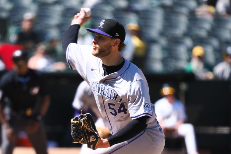 May 23, 2024; Oakland, California, USA; Colorado Rockies relief pitcher Matt Koch (54) pitches the ball against the Oakland Athletics during the eleventh inning at Oakland-Alameda County Coliseum. Mandatory Credit: Kelley L Cox-USA TODAY Sports