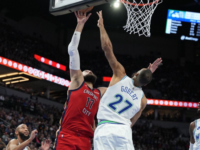 MINNEAPOLIS, MN -  JANUARY 3:  Jonas Valanciunas #17 of the New Orleans Pelicans drives to the basket during the game as Rudy Gobert #27 of the Minnesota Timberwolves plays defense on January 3, 2024 at Target Center in Minneapolis, Minnesota. NOTE TO USER: User expressly acknowledges and agrees that, by downloading and or using this Photograph, user is consenting to the terms and conditions of the Getty Images License Agreement. Mandatory Copyright Notice: Copyright 2024 NBAE (Photo by Jordan Johnson/NBAE via Getty Images)