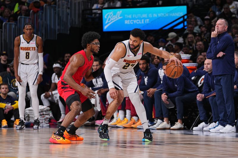 DENVER, CO - FEBRUARY 4: Scoot Henderson #00 of the Portland Trail Blazers plays defense against Jamal Murray #27 of the Denver Nuggets on February 4, 2024 at the Ball Arena in Denver, Colorado. NOTE TO USER: User expressly acknowledges and agrees that, by downloading and/or using this Photograph, user is consenting to the terms and conditions of the Getty Images License Agreement. Mandatory Copyright Notice: Copyright 2024 NBAE (Photo by Bart Young/NBAE via Getty Images)