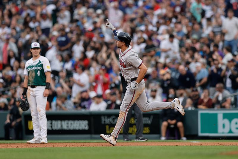 Aug 10, 2024; Denver, Colorado, USA; Atlanta Braves first baseman Matt Olson (28) gestures as he rounds the bases on a grand slam in the third inning against the Colorado Rockies at Coors Field. Mandatory Credit: Isaiah J. Downing-USA TODAY Sports