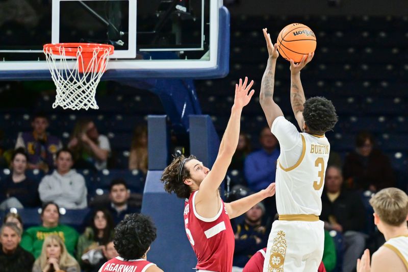 Mar 5, 2025; South Bend, Indiana, USA; Notre Dame Fighting Irish guard Markus Burton (3) shoots over Stanford Cardinal guard Benny Gealer (5) in the second half at the Purcell Pavilion. Mandatory Credit: Matt Cashore-Imagn Images