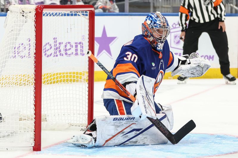 Nov 22, 2025; Elmont, New York, USA;  New York Islanders goaltender Ilya Sorokin (30) defends the net in the third period against the St. Louis Blues at UBS Arena. Mandatory Credit: Wendell Cruz-Imagn Images