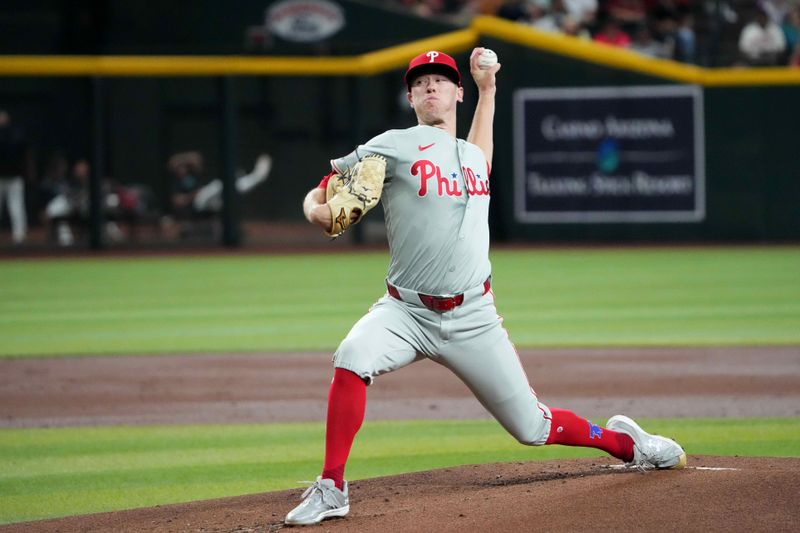 Aug 8, 2024; Phoenix, Arizona, USA; Philadelphia Phillies pitcher Kolby Allard (49) pitches against the Arizona Diamondbacks during the first inning at Chase Field. Mandatory Credit: Joe Camporeale-USA TODAY Sports