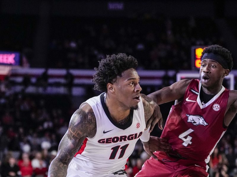 Jan 10, 2024; Athens, Georgia, USA; Georgia Bulldogs guard Justin Hill (11) dribbles past at Stegeman Coliseum. Mandatory Credit: Dale Zanine-USA TODAY Sports