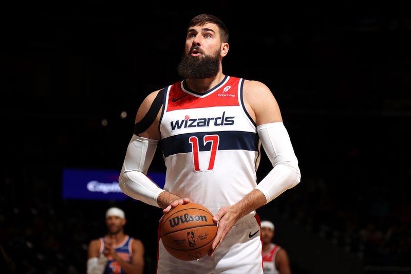 WASHINGTON, DC -? OCTOBER 18: Jonas Valanciunas #17 of the Washington Wizards prepares to shoot a free throw during the game against the New York Knicks on October 18, 2024 at Capital One Arena in Washington, DC. NOTE TO USER: User expressly acknowledges and agrees that, by downloading and or using this Photograph, user is consenting to the terms and conditions of the Getty Images License Agreement. Mandatory Copyright Notice: Copyright 2024 NBAE (Photo by Stephen Gosling/NBAE via Getty Images)