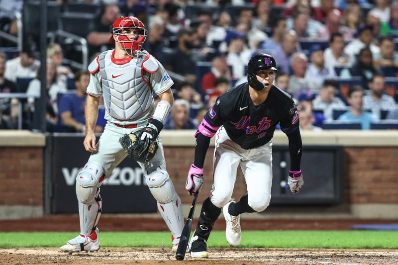 Sep 19, 2024; New York City, New York, USA;  New York Mets left fielder Brandon Nimmo (9) hits an RBI double in the fourth inning against the Philadelphia Phillies at Citi Field. Mandatory Credit: Wendell Cruz-Imagn Images